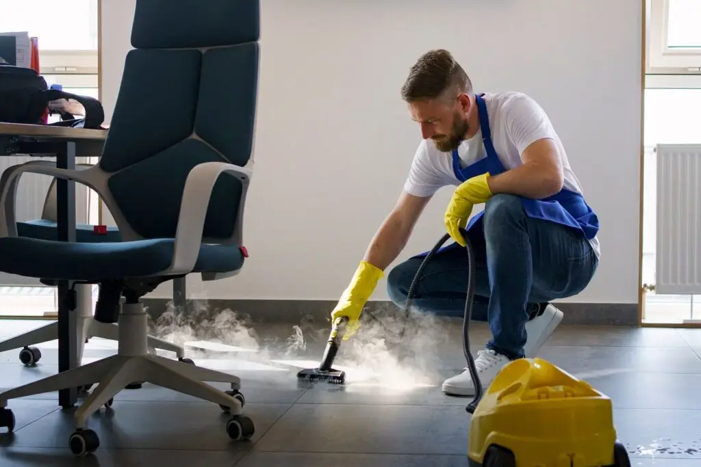 professional-cleaning-service-person-using-steam-cleaner